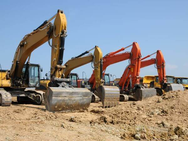 Lineup of Excavators & Articulated Boom Trucks